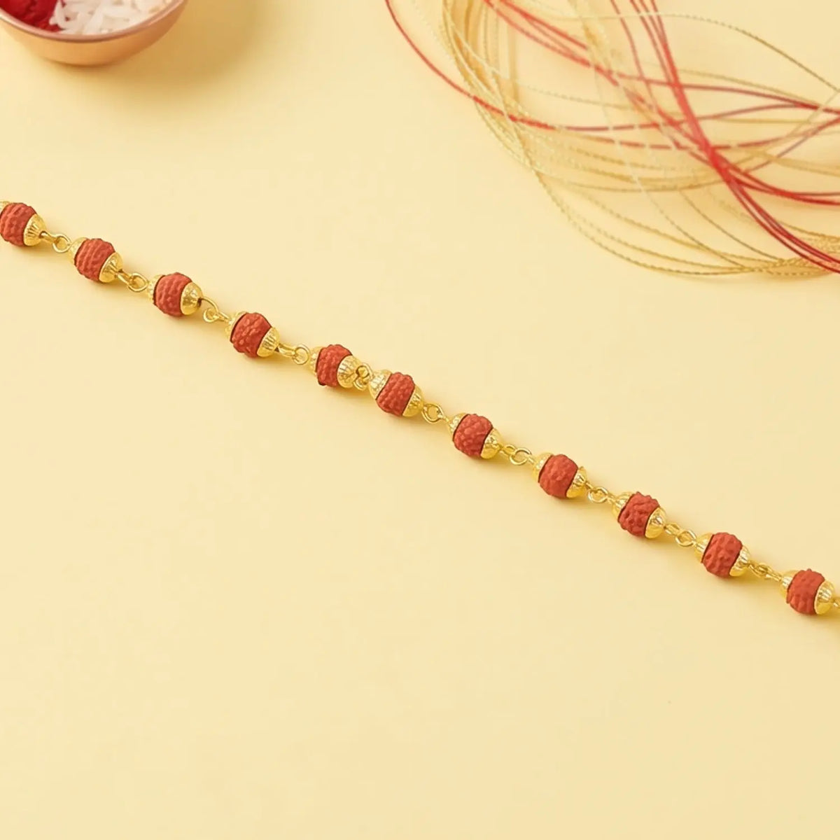 Rudraksha Bead Bracelet Rakhi Gold-plated Cap Beads Rakhi For Brother (1 Pc)
