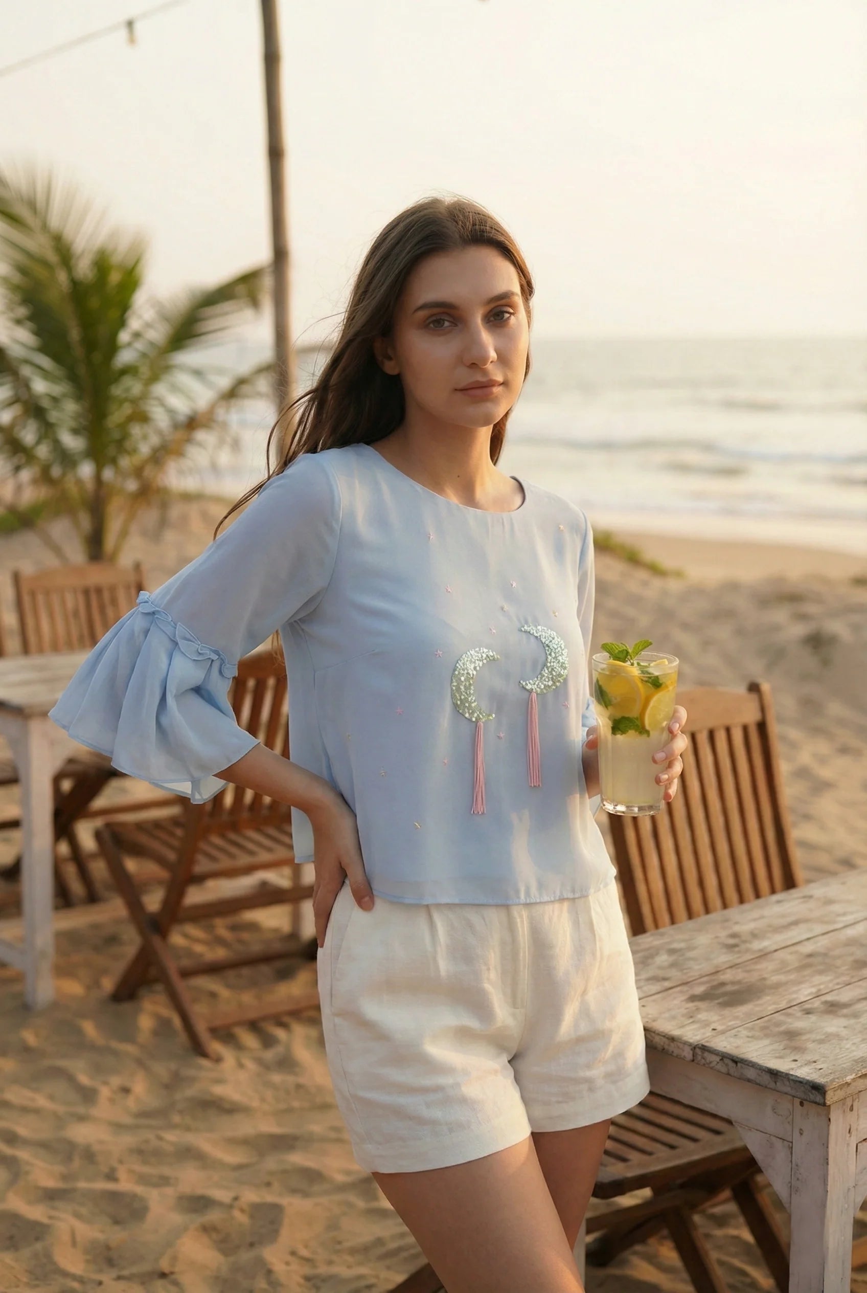 Powder Blue Georgette Top with Hand-Embroidered Moon Motifs-0