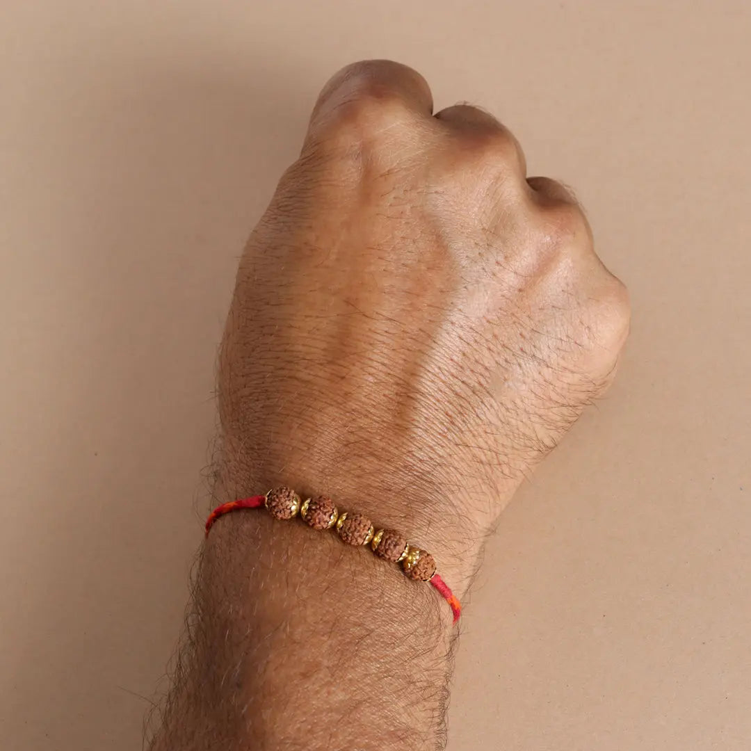 Rudraksha Golden Rakhi Pratha - Jewellery Studio