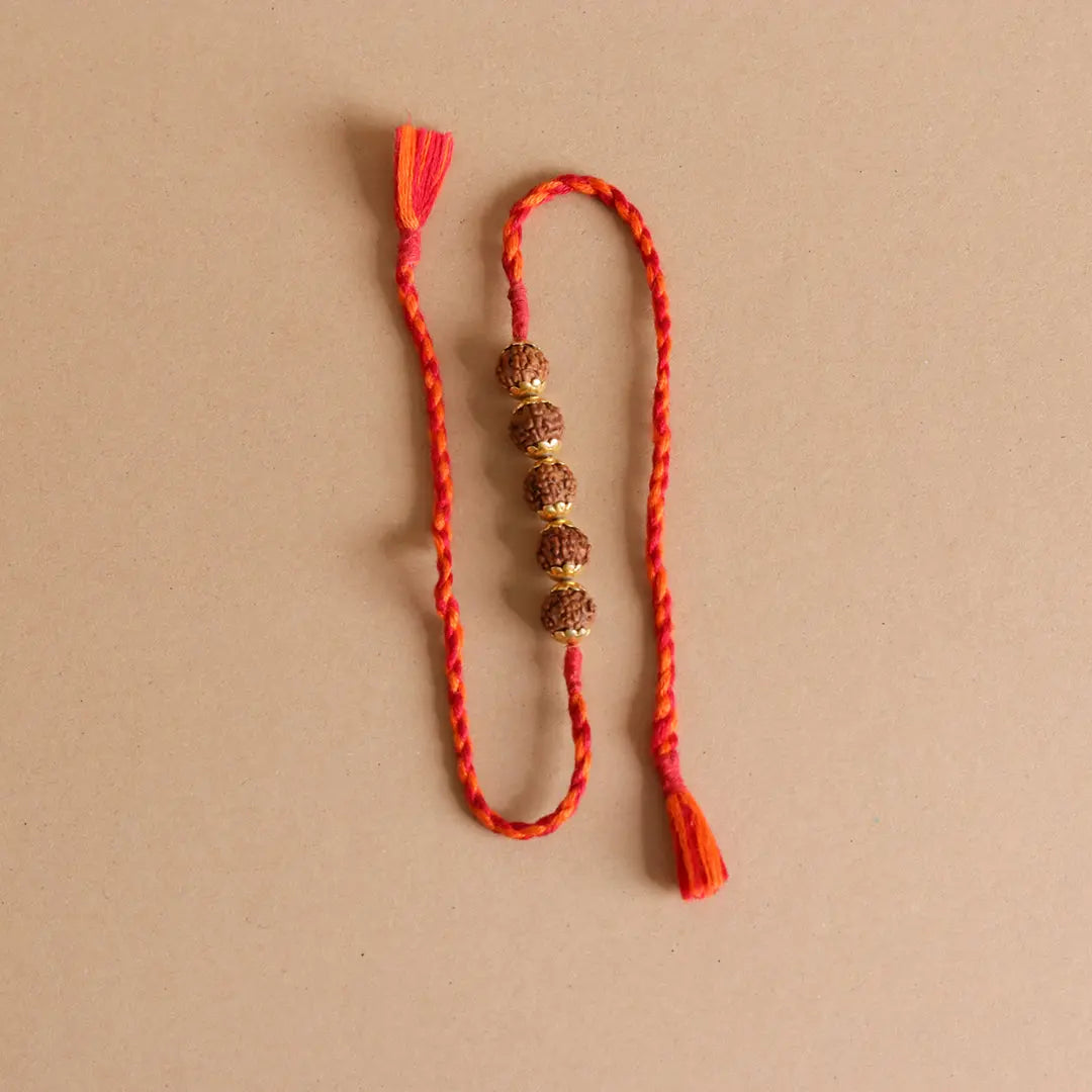 Rudraksha Golden Rakhi Pratha - Jewellery Studio