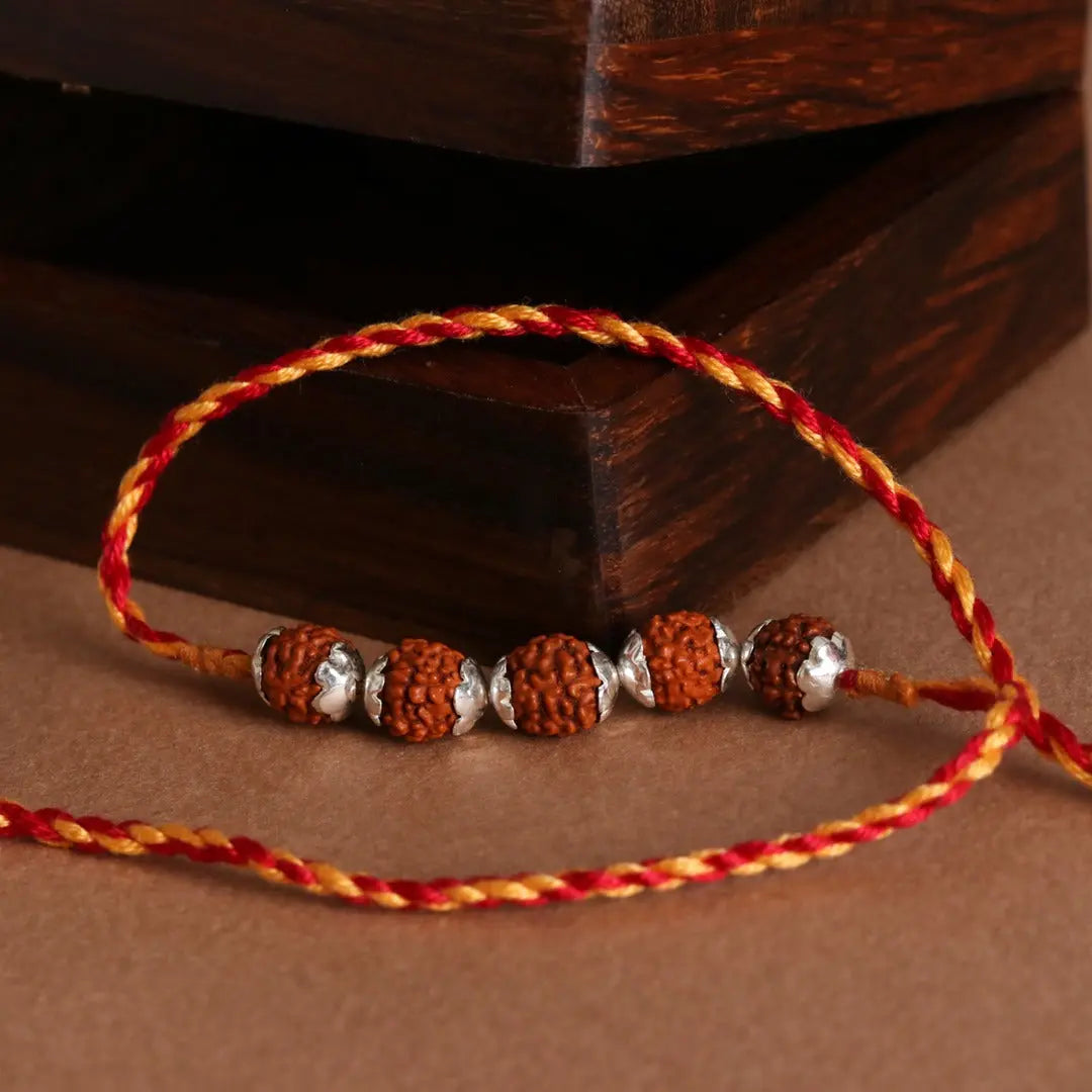 Rudraksha Silver Rakhi Pratha - Jewellery Studio