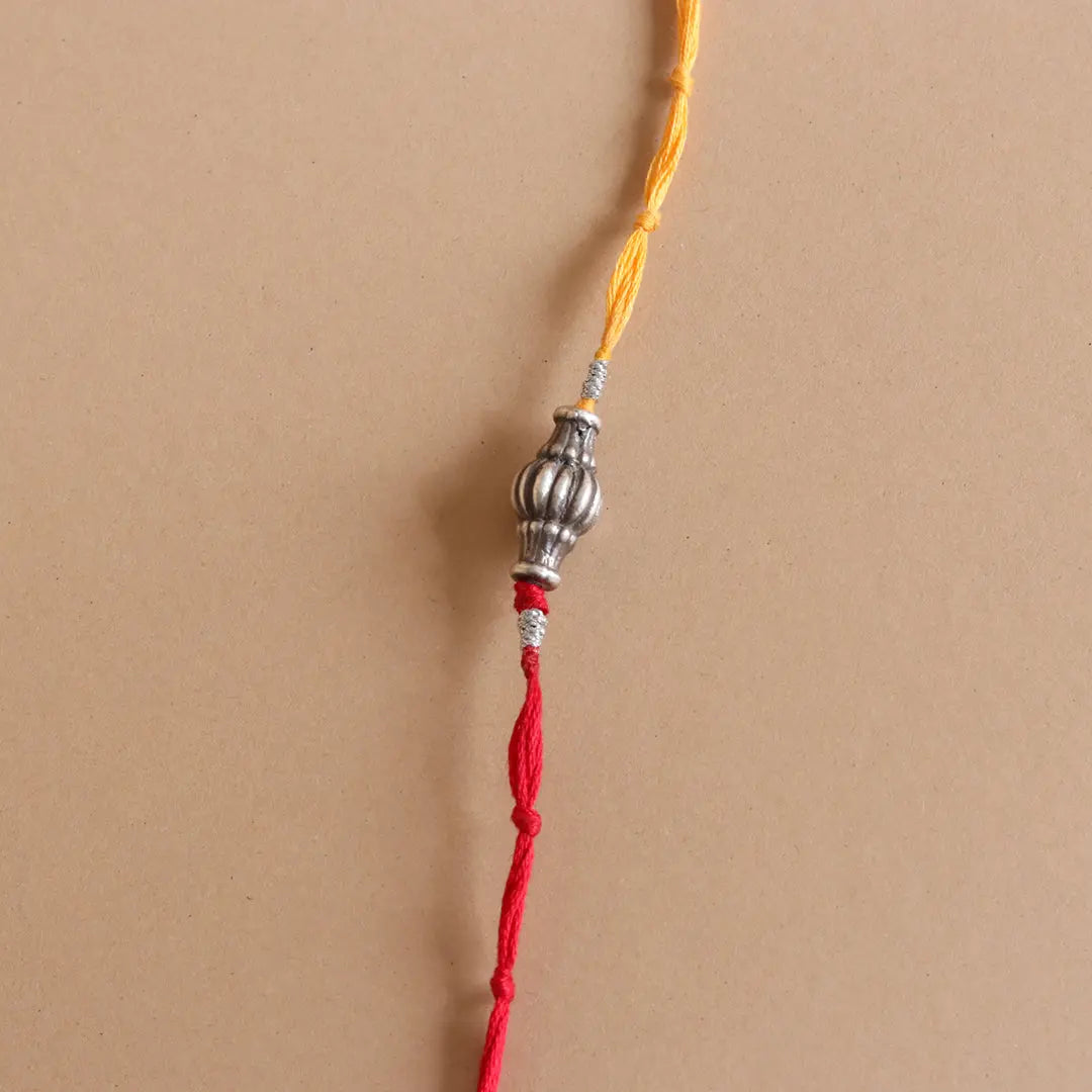 Sliver Ovol Beads Rakhi Pratha - Jewellery Studio