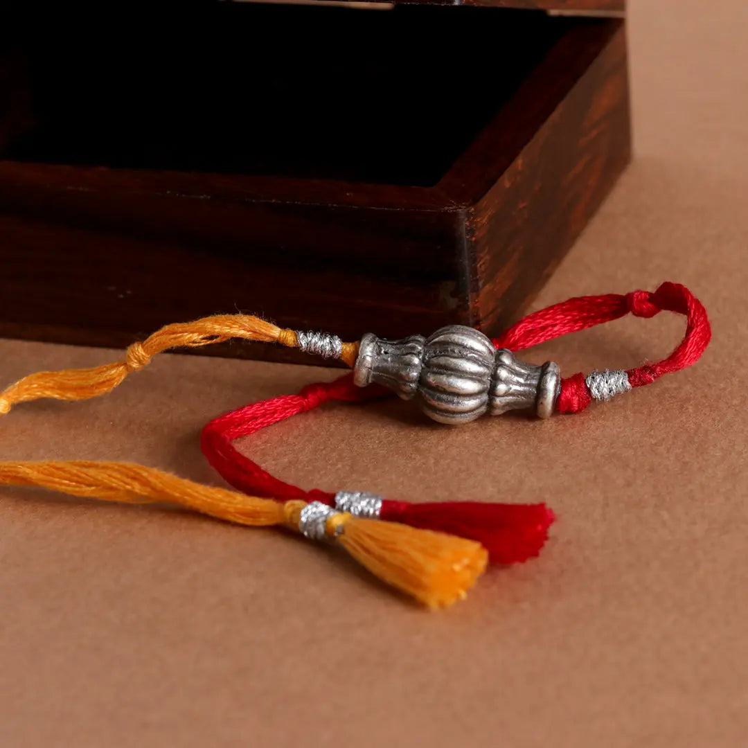 Sliver Ovol Beads Rakhi Pratha - Jewellery Studio