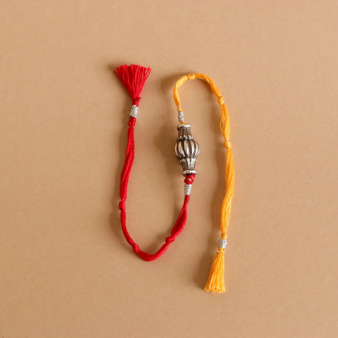 Sliver Ovol Beads Rakhi Pratha - Jewellery Studio