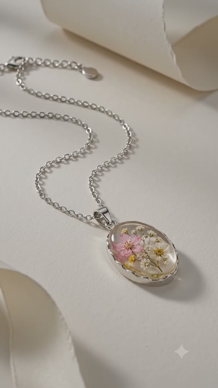Load video: Dried Flower Resin Pendant Necklace – Silver Chain
